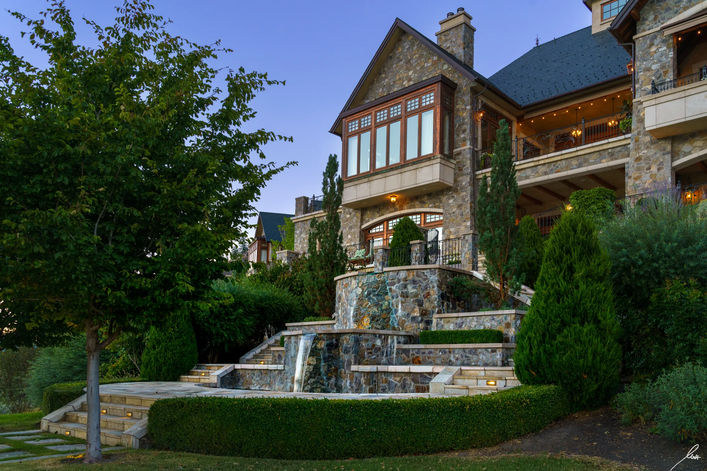 Château Okanagan estate exterior at dusk