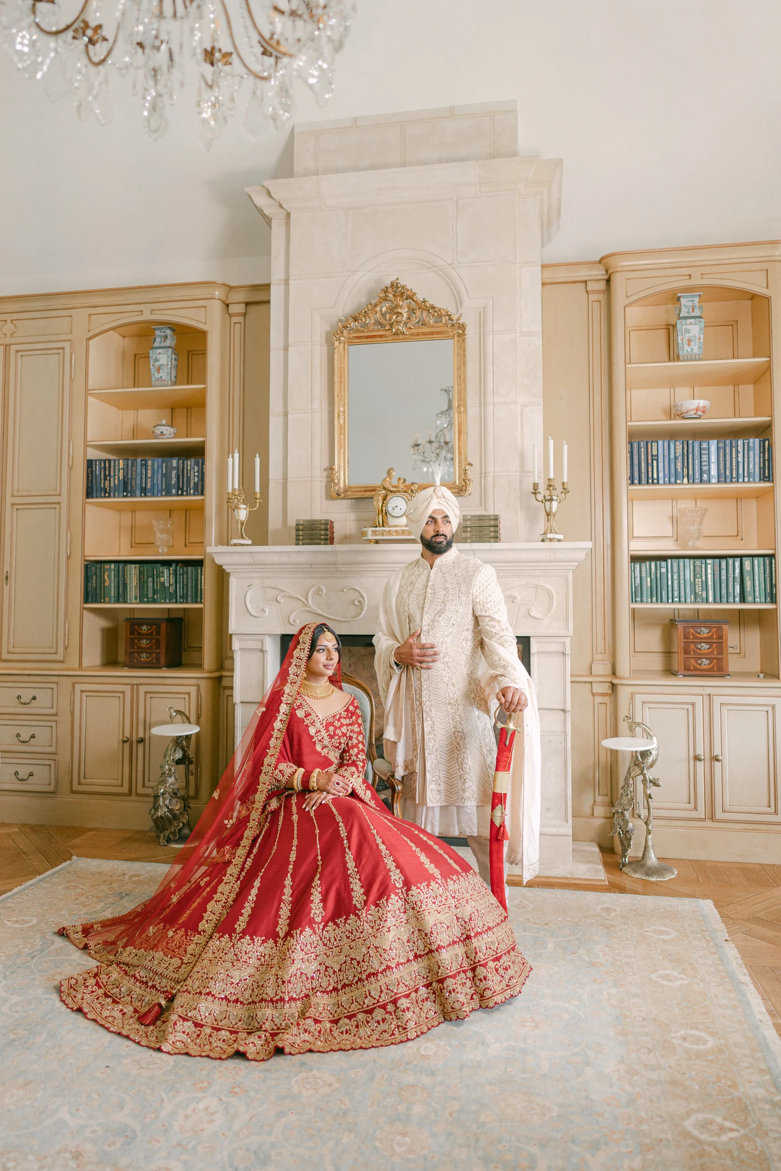 Wedding portrait by the fireplace at Château Okanagan